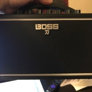 BOSS Katana Mini Guitar Amp with aux to add other instrument or vocals.